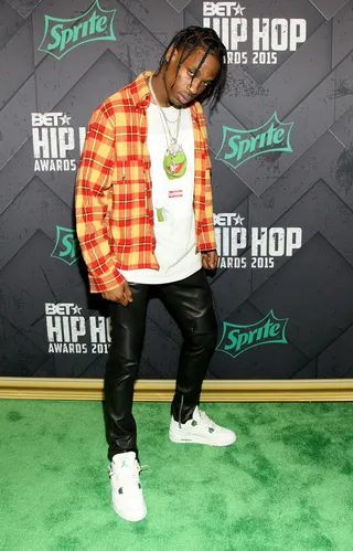 Beamed Up Scotty - Travis Scott rocked a flannel shirt and leather pants, which is an "antidote" to being cold.  &nbsp;&nbsp;(Photo: Bennett Raglin/BET/Getty Images for BET Networks)