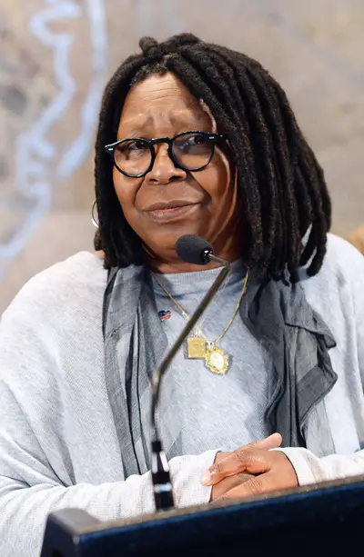 Whoopi Goldberg says she’s “not African-American,” but in a totally different way than Raven: - “This is my country. My mother, my grandmother, my great grand folks, we busted a** to be here. I’m sorry. I’m an American. I’m not an African-American! I’m not a chick American. I’m an American!”(Photo: Slaven Vlasic/Getty Images)