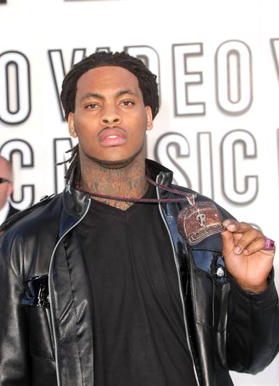 Waka Flocka Flame - Waka Flocka Flame threatened to retire from the rap game in 2011. ?I?d rather work at Wal-Mart than rap, and that?s my word on God,? he said. Naturally, he just dropped a new single and video, &quot;Round of Applause.&quot;(Photo by Frederick M. Brown/Getty Images)