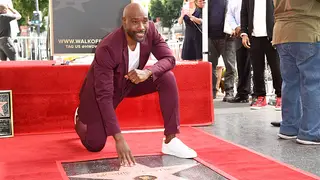 Morris Chestnut poses with his star on the Hollywood Walk of Fame on March 23, 2022 in Hollywood, California.  