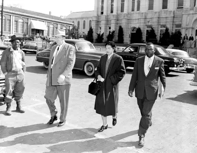The Woman Who Changed It All - Before she became “the mother of the civil rights movement,” Parks was an active member of the Montgomery NAACP and was the organization’s secretary. On Dec. 1, 1955, Parks decided to follow the actions of the younger demonstrators before her. After Parks’s arrest, the Women’s Political Council began organizing and spreading the word about a one-day boycott. A planning meeting took place at Martin Luther King Jr.’s Dexter Avenue Baptist Church on Dec. 2.&nbsp; (Photo: Bettmann/Corbis)