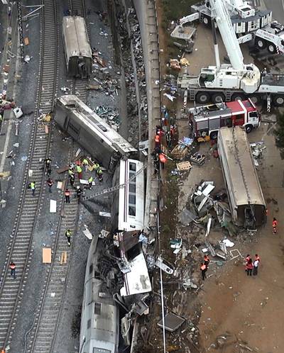 Spain Train Wreck Kills at Least 78 - A high-speed train derailed in Northwestern Spain on Monday, killing at least 78 people and injuring more than 140. Considered the worst rail accident in decades, the disaster occurred when the train jumped the tracks after approaching a curve. Spain?s prime minister has declared three days of mourning.(Photo: AP Photo)