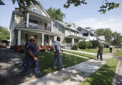 The Search for Additional Victims - After police and volunteers scoured about 40 empty homes, authorities suspended the search for additional bodies on Sunday. East Cleveland Police Chief Ralph Spotts said Monday that Madison has not been cooperative during questioning. (Photo: AP Photo/Tony Dejak)