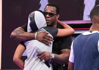 Busta! - Busta Rhymes stops through and Angela Simmons give him a huge hug.&nbsp; (Photo: Rob Kim/BET/Getty Images for BET)