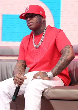 Cool Boss - Birdman just chillaxing on the 106 &amp; Park couch. (Photo: Rob Kim/BET/Getty Images for BET)
