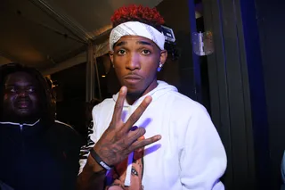 A guest rapper takes to the mic.  - (Photo: Johnny Nunez/BET)