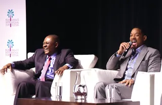 All Smiles - Will Smith brought the laughs alongside Dr. Bennett Omalu at a screening of his new film Concussion at the Annual Palm Springs International Film Festival.(Photo: Vivien Killilea/Getty Images for PSIFF)