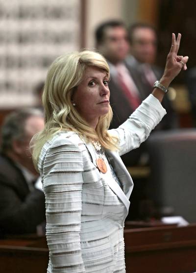 Stood Her Ground - Texas state Sen. Wendy Davis achieved national acclaim after speaking from her chamber's floor for 13 hours, which helped defeat a controversial abortion bill. &nbsp;  &nbsp;(Photo: Erich Schlegel/Getty Images)