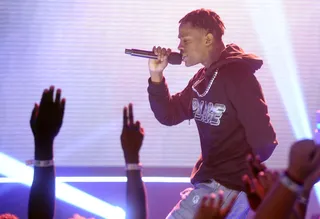 M I C - Travi$ Scott blazes the stage with a few rhymes on 106.&nbsp;(Photo:&nbsp; John Ricard/BET/Getty Images for BET)