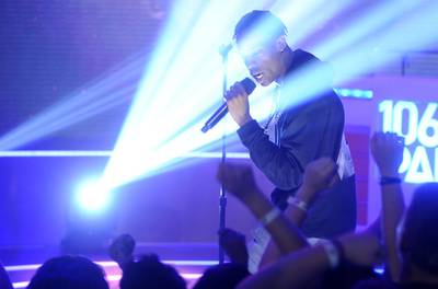 Seeing Stars - Travi$ Scott glows on the 106 stage as he spits a few bars.(Photo:&nbsp; John Ricard/BET/Getty Images for BET)