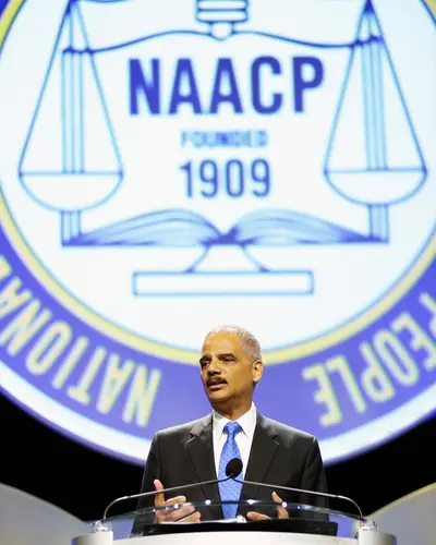 Holder Stands His Ground - The Justice Department faces an uphill battle on the possible prosecution of George Zimmerman. Attorney General Eric Holder will, however, challenge Stand Your Ground laws, which he said in a speech before the NAACP, &quot;contribute to more violence than they prevent.&quot;  (Photo: Tim Boyles/Getty Images)