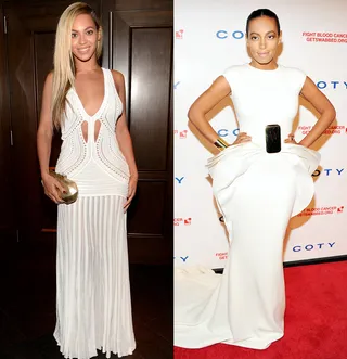 All White Everything - Beyoncé wows in her form-fitting all-white gown and Solange adds a dose of glamour to her peplum dress with a train and statement accessories.  (Photos from left: Kevin Mazur/WireImage, Theo Wargo/Getty Images)&nbsp;