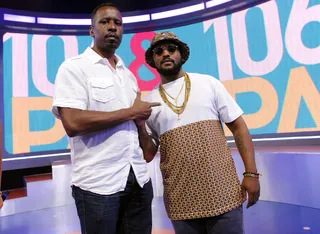 Daps - It's all love between Reginald Williams of BET and Schoolboy Q on 106. (Photo: John Ricard/BET/Getty Images for BET)