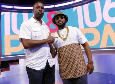 Daps - It's all love between Reginald Williams of BET and Schoolboy Q on 106. (Photo: John Ricard/BET/Getty Images for BET)