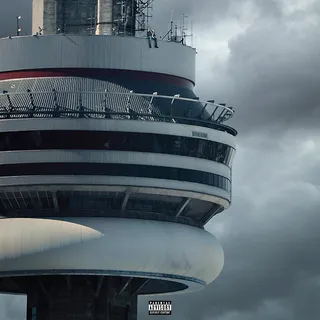 What Do You Think About Drake's New Album Cover? - Some people think Drake's View From the 6 album cover art is real. Please take a moment and think about it. The Toronto rapper is seen dangling his feet off the top of the CN Tower without any harnesses or restraints. How could that ever be real? It was reportedly confirmed that this was all Photoshopped.(Photo: OVO Sound/Young Money Entertainment)