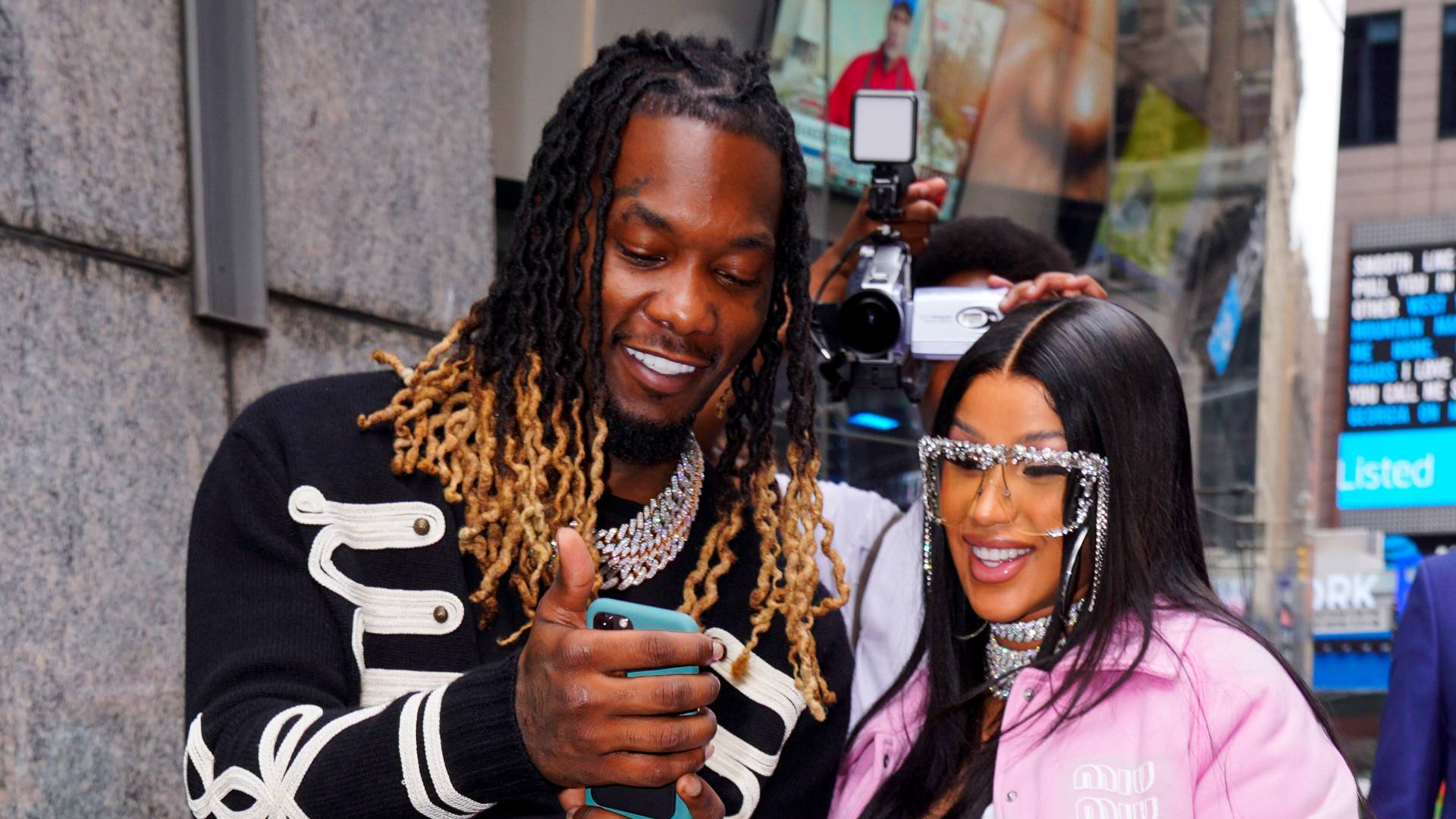 Offset and Cardi B at Nasdaq HQ in Times Square to ring the bell for Reservoir Media IPO on August 30, 2021 in New York City. 