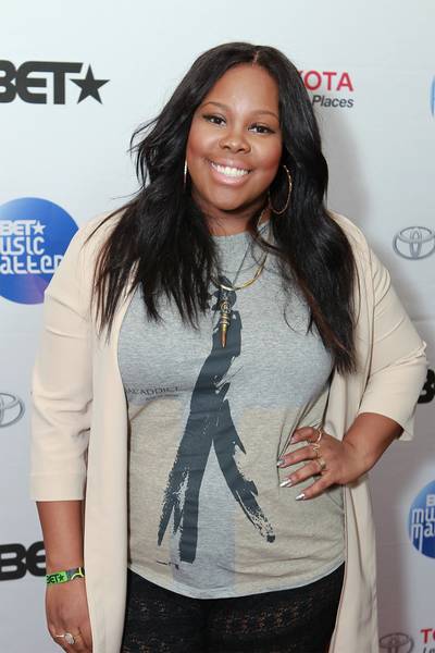 I Like Your Smile - Glee star Amber Riley was just an interested spectator last night, but it's hard for her to keep a low profile with all that talent and a million dollar smile.&nbsp; (Photo: Leon Bennett/Getty Images for BET)