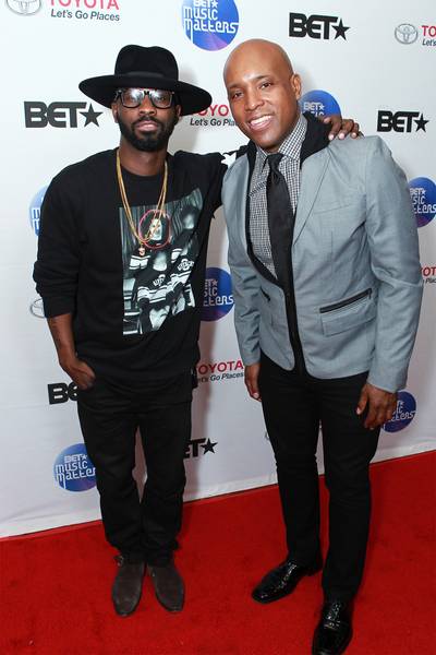 Power Players - Grammy Award winning songwriter/producer Bryan Michael Cox linked up with BET's Senior Director of Music Programming Kelly G. before the show. B. Cox was there to support all the stars of the night, especially his good friend Antonique Smith. (Photo: Leon Bennett/Getty Images for BET)