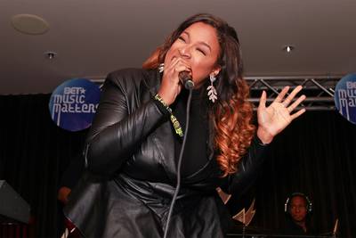 High-Powered - If you haven't seen Kierra Sheard perform live, you need to do so ASAP. Sheard, star of the BET reality show The Sheards, took the audience to church with a powerful vocal performance. (Photo: Leon Bennett/Getty Images for BET)