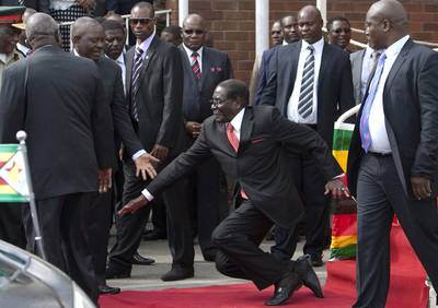 Mugabe Falls Down Steps, Sparks Viral Meme - A small misstep made by Zimbabwe President Robert Mugabe quickly avalanched into a viral sensation on Wednesday, the Washington Post reports. The 90-year-old leader had just delivered a speech when, after he talked down the podium, he seemed to trip and fall. A verbose statement of denial issued by Zimbabwe’s government (&quot;Even Jesus, let alone you, would have also tripped in that kind of situation”) reportedly inspired a series of #MugabeFalls memes on Twitter. In the comical images, Mugabe is Photoshopped into various scenes, including Beyoncé’s “Single Ladies” video.(Photo: AP Photo)