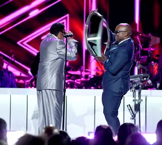 Morris Day and Jerome Benton make sure they look fresh onstage. - (Photo by Ethan Miller/Getty Images for BET)