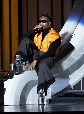 Doctur Dot keeps things low key onstage at the Soul Train Awards. - (Photo by Ethan Miller/Getty Images for BET)&nbsp;