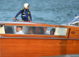 Rock the Boat - The Obamas spent the rest of the afternoon doing some sightseeing by boat around Venice. (Photo: PA PHOTOS /LANDOV)