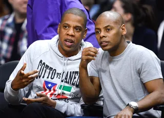 Downtime - Jay Z and his bestie business partner Ty Ty sit courtside inside the Staples Center to watch an NBA game between the Golden State Warriors and the Los Angeles Clippers in downtown L.A..(Photo: Noel Vasquez/GC Images)