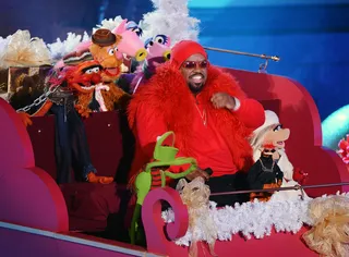 Black Santa Claus - Singer Cee Lo Green dons his winter gear and rides a sleigh full of Muppets for his performance at the 80th Annual Rockefeller Center Christmas tree lighting ceremony in New York City.(Photo: Stephen Lovekin/Getty Images)