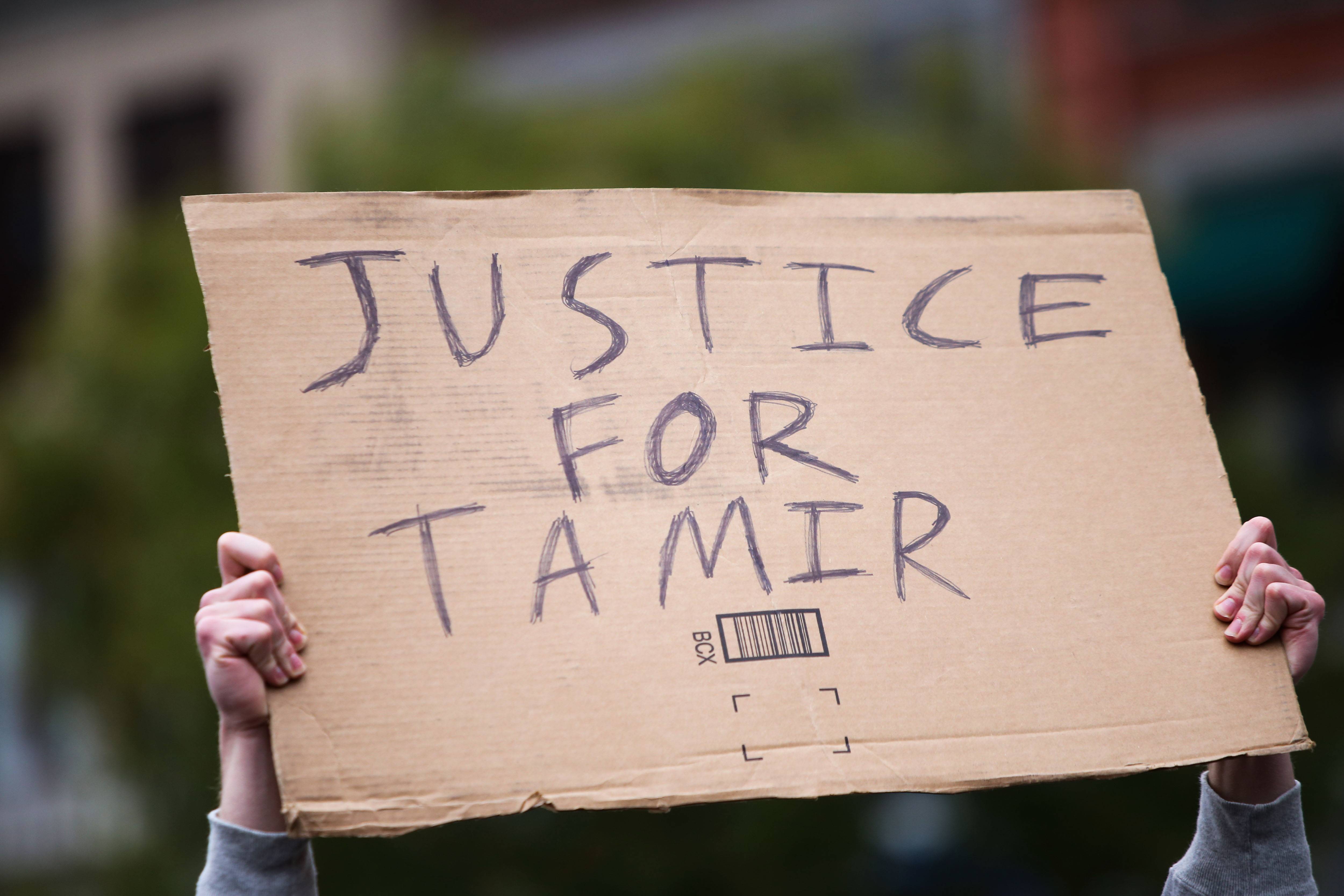 MANHATTAN, NEW YORK CITY, NEW YORK, UNITED STATES - 2015/11/22: Justice for Tamir sign held aloft. Stop Mass Incarcerations Network sponsored a children's march demanding accountability on the one year anniversary of Tamir Rice's death at the hands of the Cleveland police. (Photo by Andy Katz/Pacific Press/LightRocket via Getty Images)