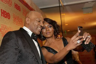 #Selfie&nbsp; - Former Heavyweight Champion Mike Tyson and actress Angela Bassett attend HBO's Post 2014 Golden Globe Awards Party held at Circa 55 Restaurant in Los Angeles. (Photo: Mike Windle/Getty Images)
