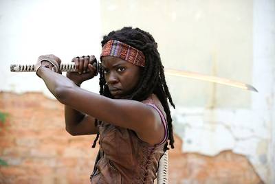 Danai Gurira in The Walking Dead - The Zimbabwean-American actress plays one of the most terrifying and complex characters on television. As the survivalist Michonne on The Walking Dead, Gurira counts only on herself, her sword and her zombie pets to stay alive. (Photo: AMC)