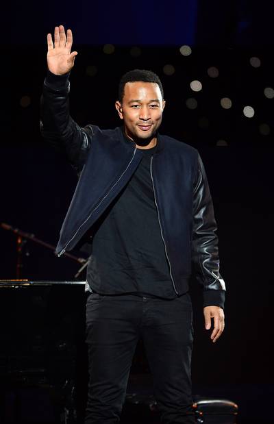 Touching the Future - Recording artist John Legend waves after performing during a keynote address by Yahoo! President and CEO Marissa Mayer at the 2014 International CES at the Las Vegas Hotel &amp; Casino in Las Vegas.&nbsp;(Photo: Ethan Miller/Getty Images)