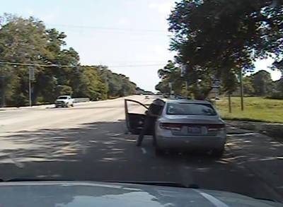 More Outrage Over Dashcam Video - Outrage is growing after the Waller County, Texas, police released a dashcam video of State trooper Brian Encinia threatening to drag Sandra Bland from her vehicle. &quot;I will light you up!&quot; he told Bland after she refused to leave her vehicle upon his request. The officer reportedly asked Bland to put out her cigarette, but she refused.&nbsp;Trooper Brian Encinia is currently on administrative leave.(Photo: Texas Department of Public Safety via AP)