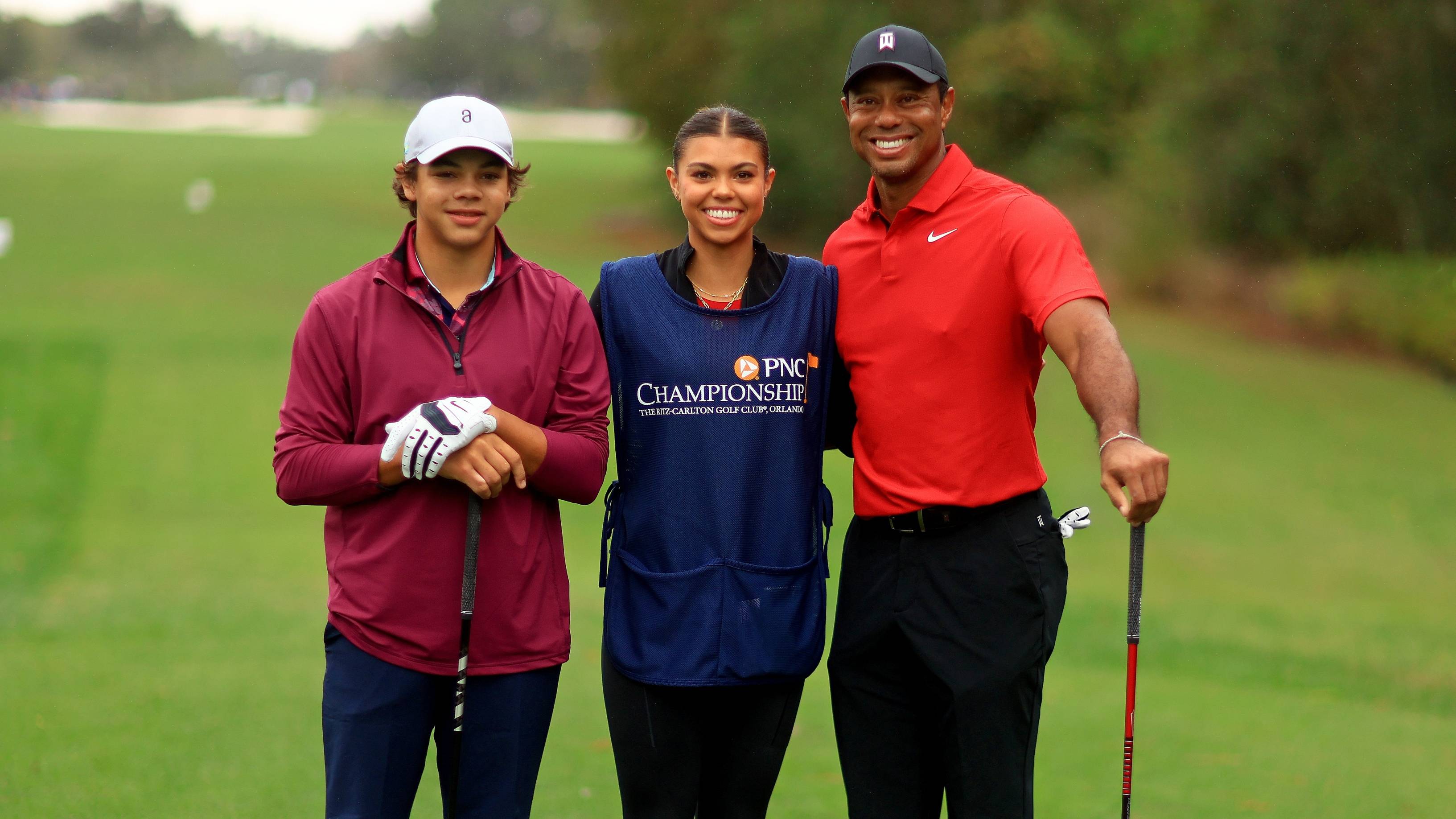 Tiger Woods, Charlie Woods and Sam Woods of the United States during the final round of the PNC Championship at The Ritz-Carlton Golf Club on December 17, 2023 in Orlando, Florida. 