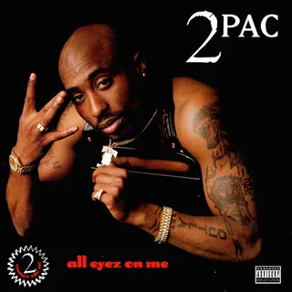 Gangsta Mentality - Tupac’s fourth album, All Eyez on Me, blew everyone out of the water. The project included songs like “I Ain’t Mad at Cha” and “How Do You Want It.” It sold 6 million copies after just a year, something unheard of at the time. Today, it’s one of the best-selling U.S. albums of all time. (Photo: Death Row Records/Interscope Records)