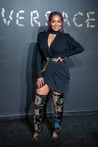 Vixen In Versace&nbsp; - Mrs. Anthony showed up to the&nbsp;Versace Fall 2019 fashion show wearing&nbsp;a little black wrap dress with thigh-high velvet boots by Versace.(Photo: Roy Rochlin/Getty Images) (Photo: Roy Rochlin/Getty Images)