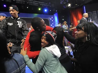 Hugs - Cali Swag District reaches out to touch the fans at 106 &amp; Park, March 7, 2012.&nbsp; (Photo: John Ricard / BET)