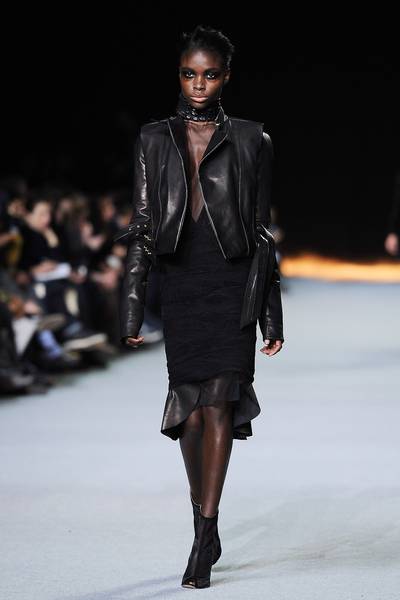 Go Gothic - Kanye’s onyx-heavy collection was marked by gothic styling and edgy additions including the croc collar on this leather look. (Photo: Pascal Le Segretain/Getty Images)