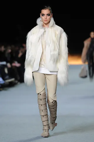 Boots and Fur - Kanye’s fur pieces and mile-high boots made for striking details of the show. Couldn’t you see a celeb wearing this look on the street? (Photo: Pascal Le Segretain/Getty Images)