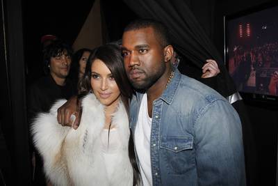 Fashionable Friends - Kim Kardashian shows support for her friend Kanye West at the unveiling of West's Fall/Winter 2012 Ready-To-Wear collection shown on the runways of Paris Fashion Week at Halle Freyssinet in Paris, France. (Photo: Eric Ryan/Getty Images)