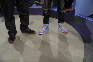 Check Out the Sneaks - Ice Cube and Terrence J during a commercial break at 106 &amp; Park, March 05, 2012. (Photo: John Ricard / BET)