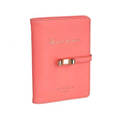 Ted Baker Coral Travel Document Holder ($45)&nbsp; - Maybe this gorg travel organizer will encourage her to actually use her vacation time this year?(Photo: Ted Baker)