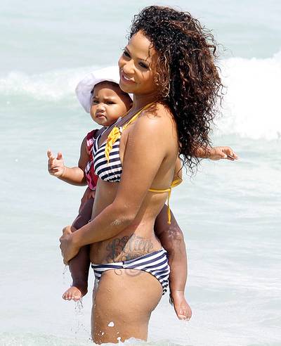 Christina Milian - Christina Milian is one hot mama and it only takes a fancy script design tattoo on her hip area to take that hotness to greater heights.  (Photo: BRJ/Fame Pictures)