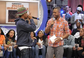 Let See - Curren$y with Terrence J at 106 &amp; Park, June 4, 2012. (Photo: John Ricard / BET)