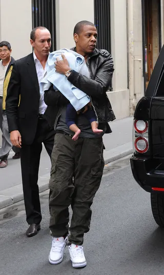 Jay, Not for Play - Jay-Z is fiercely protective of his baby girl, Blue Ivy. The rap impressario was spotted holding his little one close and covering her up from the prying eyes of the paps as he and his wife, Beyoncé, headed into Meurice Hotel in Paris. Jay and Bey are in town for the Watch the Throne tour. He and Yeezy were said to have performed their hit controversial track "N-----s in Paris" 11 times in one-night at the opening show.   (Photo: DLM Press, PacificCoastNews.com)