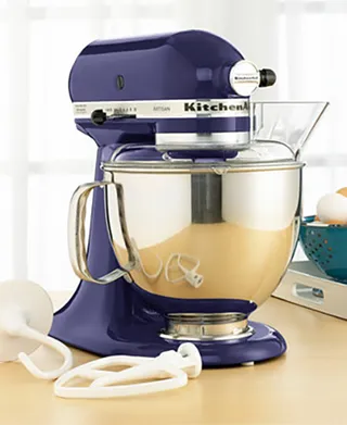 KitchenAid KSM150PS Artisan 5 Qt. Stand Mixer - What foodie who loves to throw down in the kitchen hasn’t dreamt about owning an KitchenAid mixer? Make those wishes come true by snagging one at Macy’s for $349.99. (Photo: Macy’s)