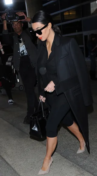 Flashing Lights - Kim Kardashian is besieged by the paparazzi at LAX Airport&nbsp;following her return from Dubai.(Photo: Chessa /London Entertainment/Splash News)