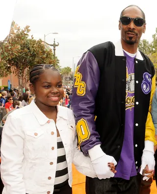 Snoop Dogg and Cori B - Following in the footsteps of her father, West Coast legend Snoop Dogg, Cori B is making her own mark on pop culture. The rap royalty released her debut single, "Do My Thang," back in 2011, appeared in her father's video for the song "Daddy's Girl," and most recently was featured on his Reincarnation track, "No Guns Allowed."&nbsp;(Photo: Frank Micelotta/PictureGroup)