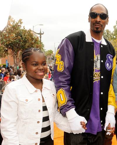 Snoop Dogg and Cori B - Following in the footsteps of her father, West Coast legend Snoop Dogg, Cori B is making her own mark on pop culture. The rap royalty released her debut single, &quot;Do My Thang,&quot; back in 2011, appeared in her father's video for the song &quot;Daddy's Girl,&quot; and most recently was featured on his Reincarnation track, &quot;No Guns Allowed.&quot;&nbsp;(Photo: Frank Micelotta/PictureGroup)